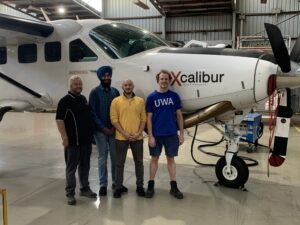 The UWA team with Xcalibur and a Cessna 208 aircraft.